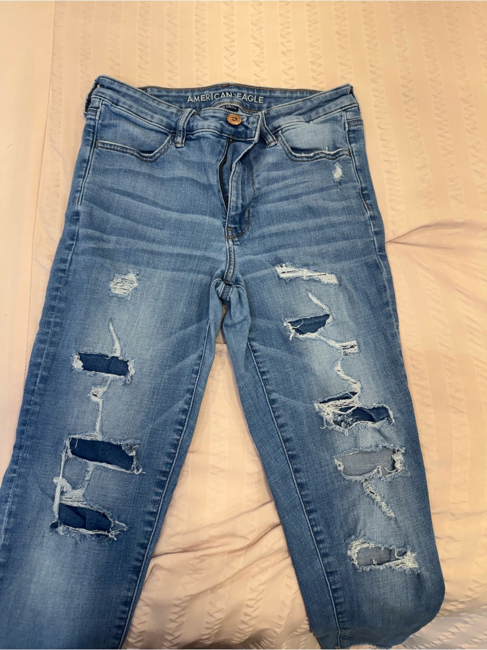 American Eagle Outfitters Light Blue High-Rise Distressed Jeans